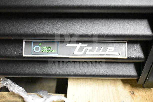 BRAND NEW SCRATCH AND DENT 2025 True GDM-47-HC-LD Cooler; missing doors; 115V, 1 Phase; "natural refrigerant" label.