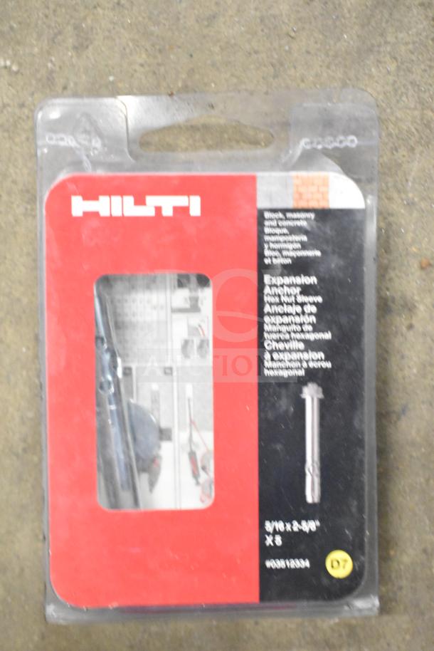 DeWalt hard tool box containing a Hilti tool and drill bits. Tool box is durable, good condition, includes expansion anchor set.