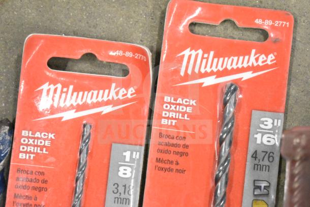 Milwaukee black oxide drill bits, sizes 1/8" and 3/16", in original packaging, labeled for durability and precision.