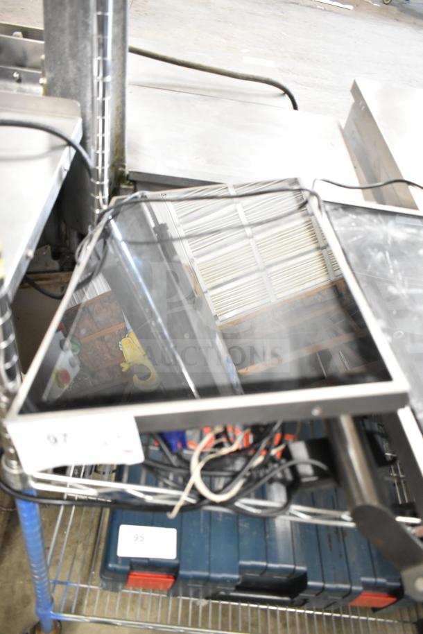 Auction items include a Kitchen Armor monitor and Thin Client Mini PC, on a shelf with visible cables and blue cases.