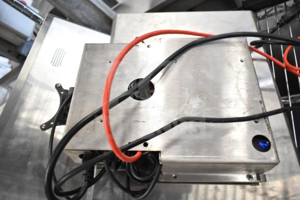 Metallic casing of Kitchen Armor Monitor with exposed cables, part of a lot including Thin Client Mini PC. Used condition.