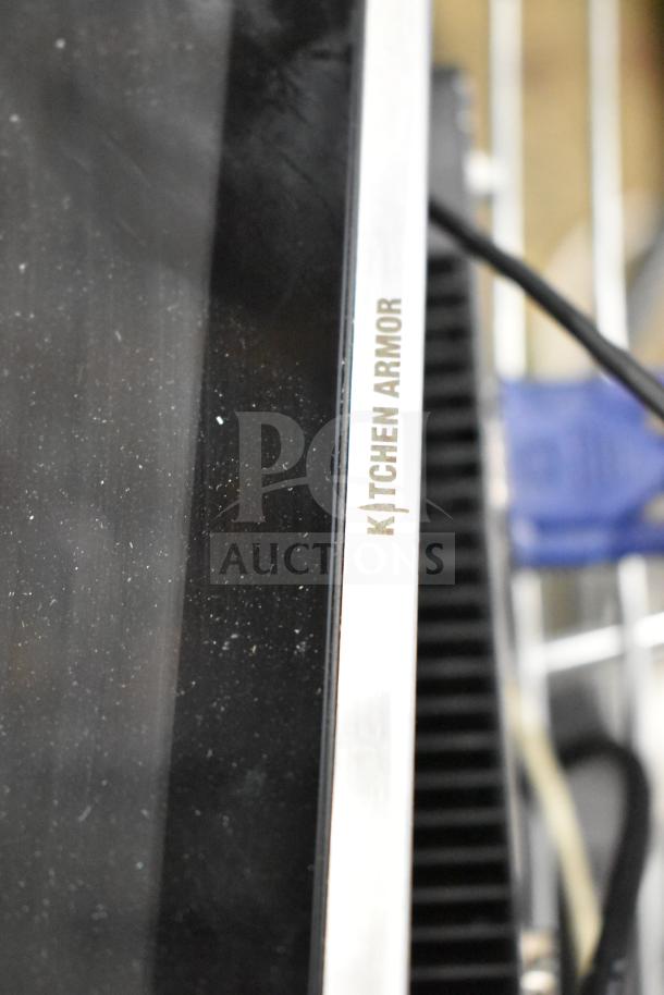 Kitchen Armor monitor with visible logo, slight surface wear, part of auction lot with Thin Client Mini PC.