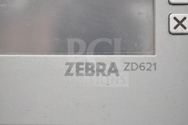 Zebra ZD621 desktop direct thermal barcode printer, brand logo and model visible, in used condition.