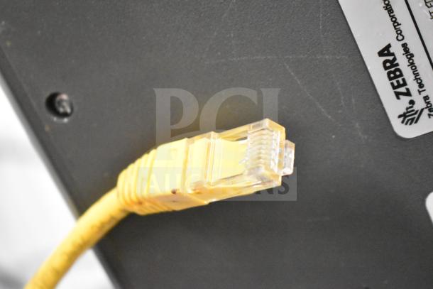 Zebra ZD621 Desktop Direct Thermal Barcode Printer bottom view with Ethernet port and label.