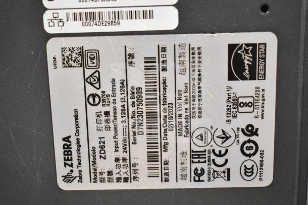 Label detail of Zebra ZD621 Desktop Direct Thermal Barcode Printer, Energy Star certified, serial D7N230750989, made in Vietnam.
