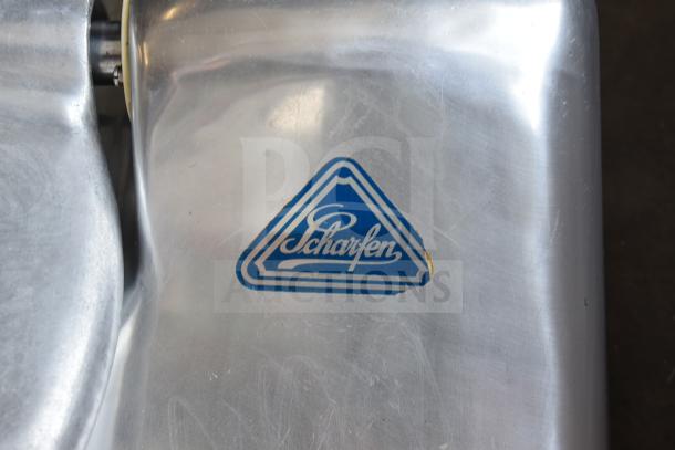 Scharfen Commercial Buffalo Chopper, stainless steel finish, Scharfen logo visible, slight surface wear.
