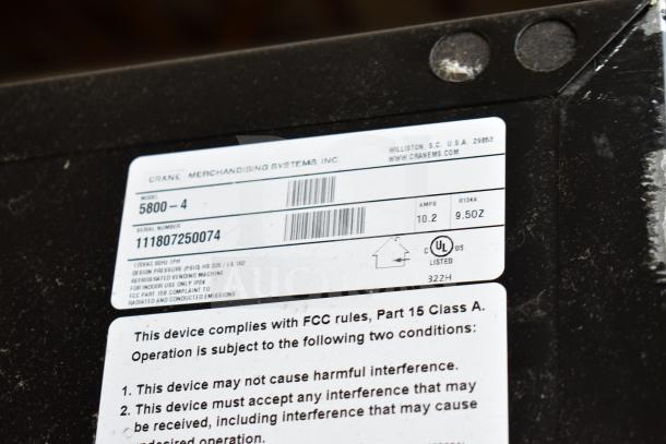 Crane 5800-4 Commercial Bottled Drink Vending Machine, features bill acceptor, 115 volts, model tag visible.