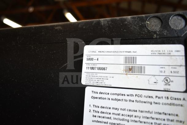 Crane 5800-4 commercial drink vending machine label, showing model and serial number. 115 volts, 1 phase.