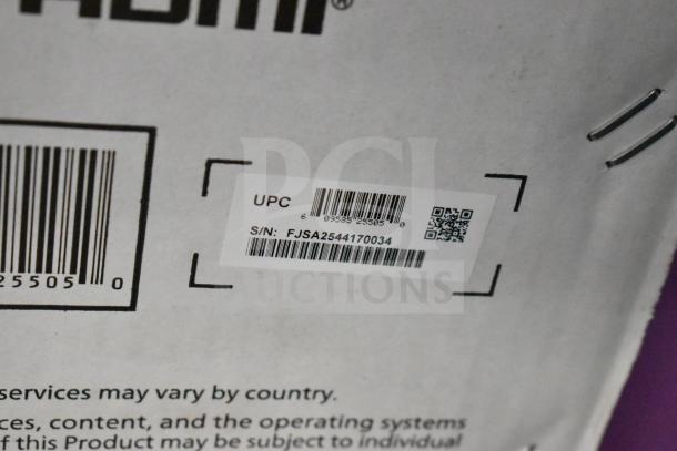 Barcodes and serial number "FJSA2544170034" on package for auction TVs. Vizio 55" and Roku 65". Condition unverified. Buyer pickup only.