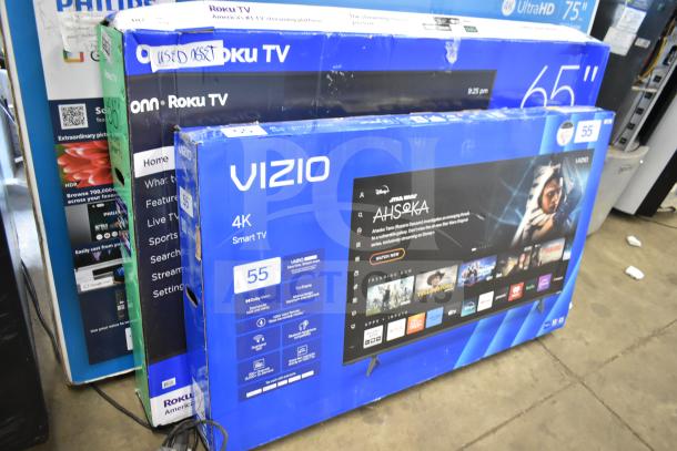 Vizio 55" 4K Smart TV and Roku 65" TV in original boxes, condition unverified. Labels indicate "used asset." Pickup only.