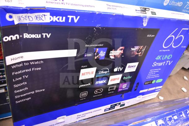 Vizio 55" and Roku 65" TVs in original boxes, condition unverified. Note: "Used Asset" label on box. Buyer pickup required.