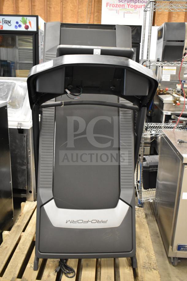 Pro Form PFTL59724.3 folding treadmill, 120 volts, 1 phase, good condition, brand label visible on base.