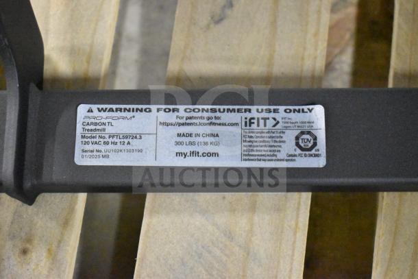 Pro Form PFTL59724.3 folding treadmill label, 120VAC, 60Hz, 12A, made in China, 300 lbs capacity, serial number visible.