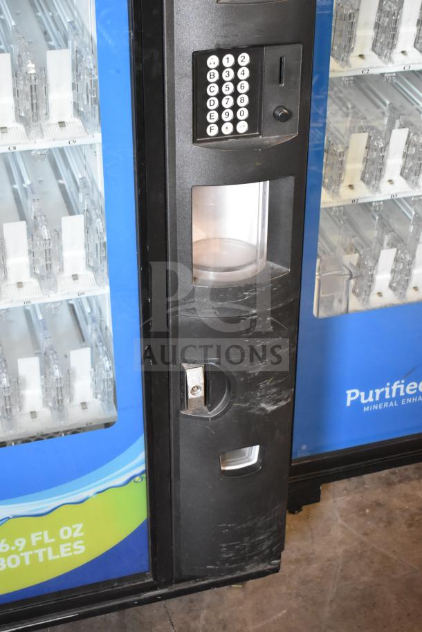 Crane 5800-4 vending machine, bottle display, keypad, bill acceptor, used condition, 115 volts, 1 phase.
