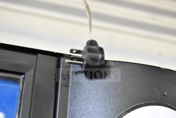 Crane 5800-4 vending machine power plug detail, showing the machine's 115V compatibility.