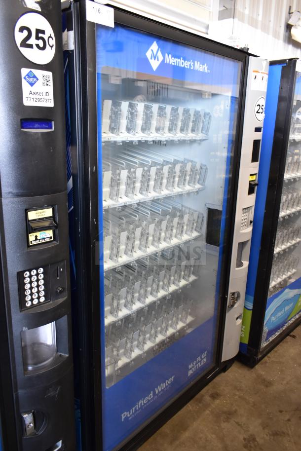 Crane 5800-4 vending machine with bill acceptor. Dispenses bottled drinks. 25¢ price, Member's Mark branding, 115V.