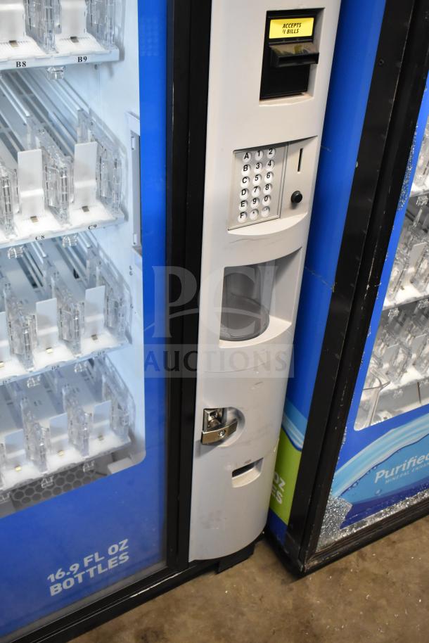 Crane 5800-4 commercial bottled drink vending machine with bill acceptor, 115 volts, 1 phase. Well-maintained condition.