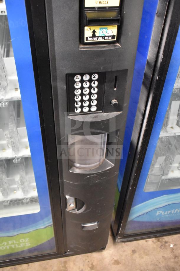 Crane 5800-4 vending machine with bill acceptor, keypad, and bottle display. 115 volts, 1 phase, commercial model.