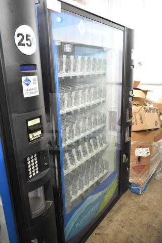 Crane 5800-4 bottled drink vending machine, features bill acceptor, 25¢ label, operates on 115 Volts, 1 Phase.