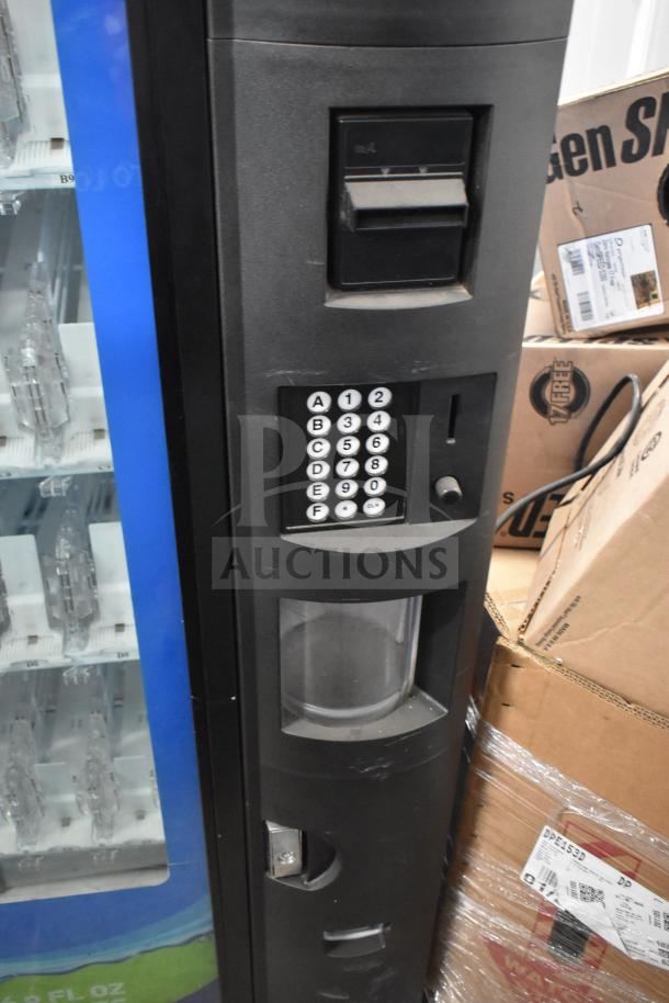 Crane 5800-4 vending machine with bill acceptor, keypad, black exterior; 115 volts, 1 phase.