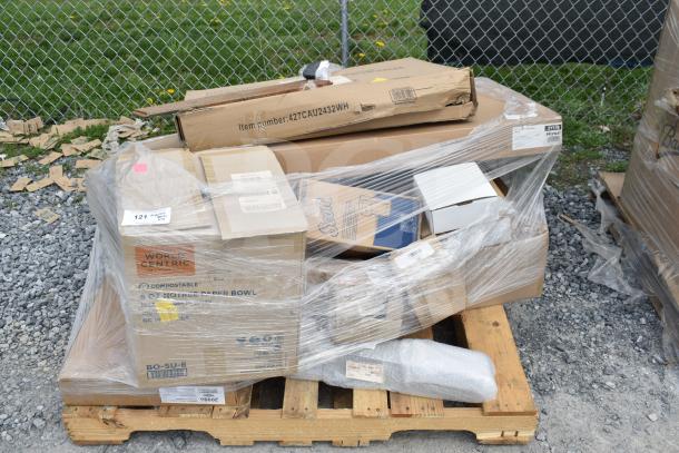 Palette with 13 new scratch-and-dent items wrapped in plastic, including mobile desk and shelving unit. Boxes show product details.