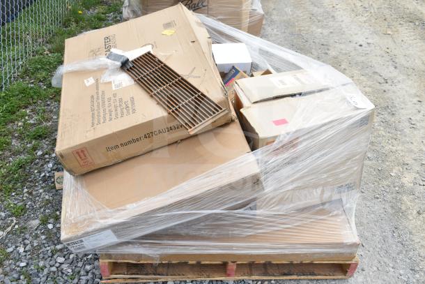 Pallet with 13 new scratch and dent items, including boxes labeled with item number 427CAU2432V. Contains mobile desk, shelving unit, and light. Plastic-wrapped with visible tags.