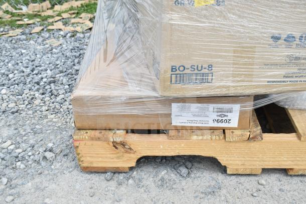 Pallet of 13 brand new scratch and dent items, shrink-wrapped, including mobile desk, shelving unit, and light.