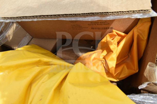 Box of new scratch and dent items including hand soap, tape. Includes Kindest Kare Hand & Body Wash cartridges.