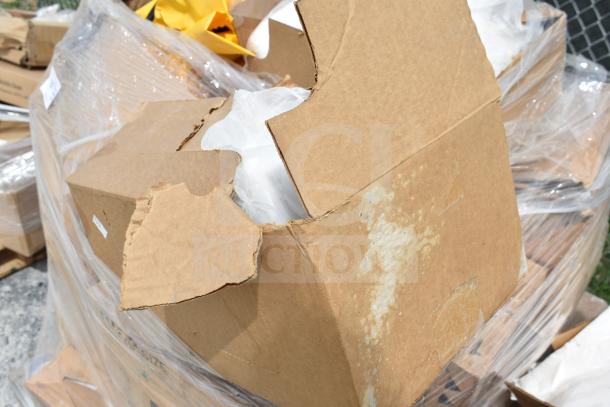 Box of scratch and dent items, including powdered hand soap and tape, with visible packaging damage. 17 items total.
