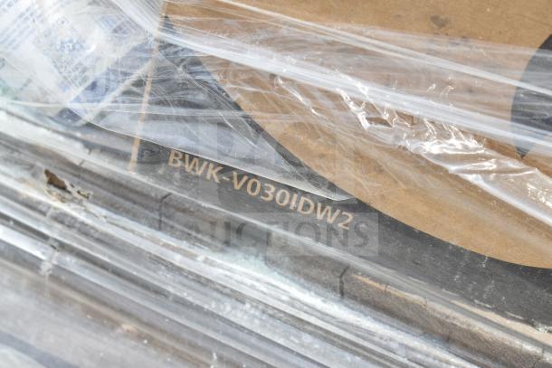 Sealed package showing part number "BWK-V030IDW2," containing 17 new scratch and dent items, including hand soap and tape.