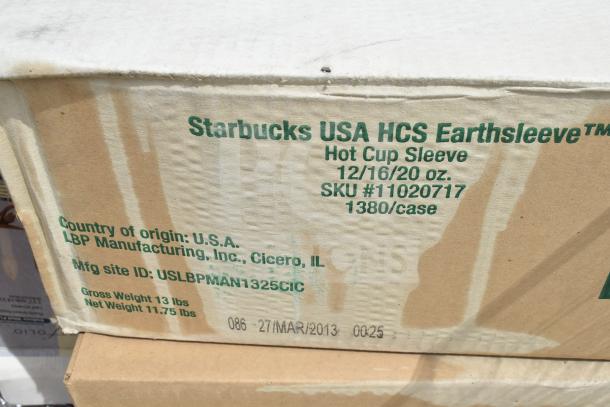 Cardboard box labeled "Starbucks USA HCS Earthsleeve™ Hot Cup Sleeve" showing details like SKU #11020717 and manufacturing info.