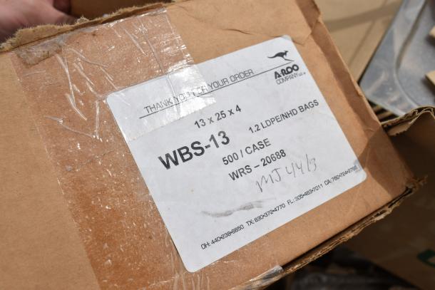 A cardboard box labeled "A-ROO Company" contains scratch and dent items, including 500 WBS-13 1.2 LDPEINHD bags, 13x25x4".