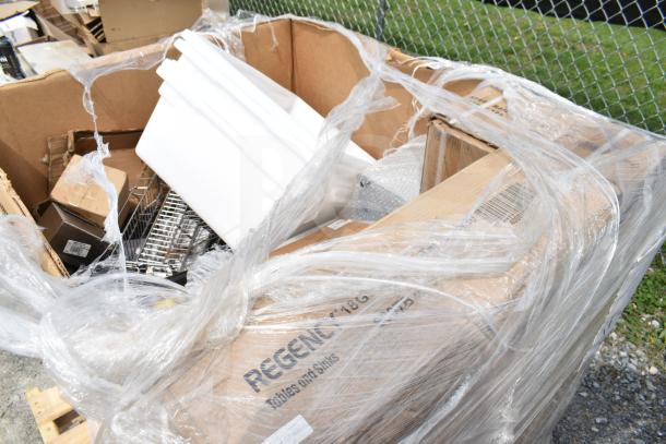 18 new scratch and dent items in open packaging, includes work table, speed rail; labeled "Regency Tables and Sinks."