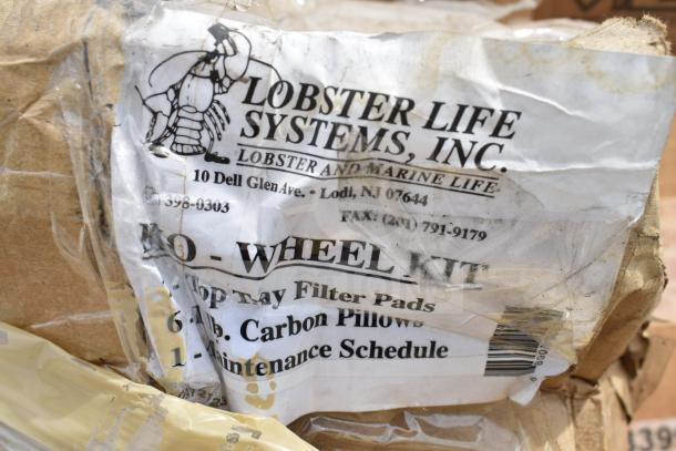 Bag with label from Lobster Life Systems, Inc. displaying address and contact details for lobster and marine life supplies.