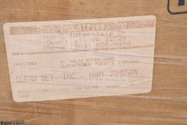 Label on a cardboard box showing details: "Abel Industries, Inc," an address in Dumfries, VA, a phone number, product code COJ_7565, and "C-Multi Green Hand Cleaner/Scrub Particle."