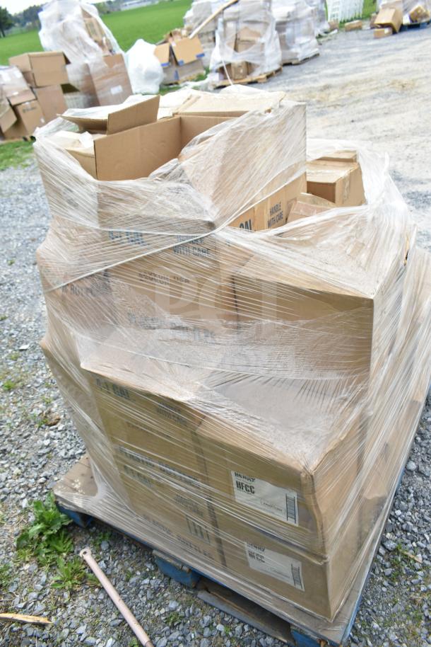 Pallet of 38 brand new scratch and dent boxes, each containing various cleaners and bottles, wrapped in plastic.