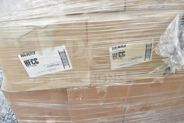 Pallet of Henry HFCC floor cleaners in original packaging, wrapped in plastic. Some boxes show minor wear.