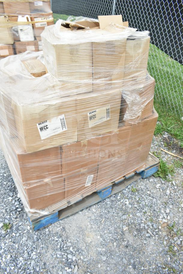 Palette of 38 new scratch and dent items, including various cleaners and bottles. Items wrapped in plastic, stored on a blue pallet.