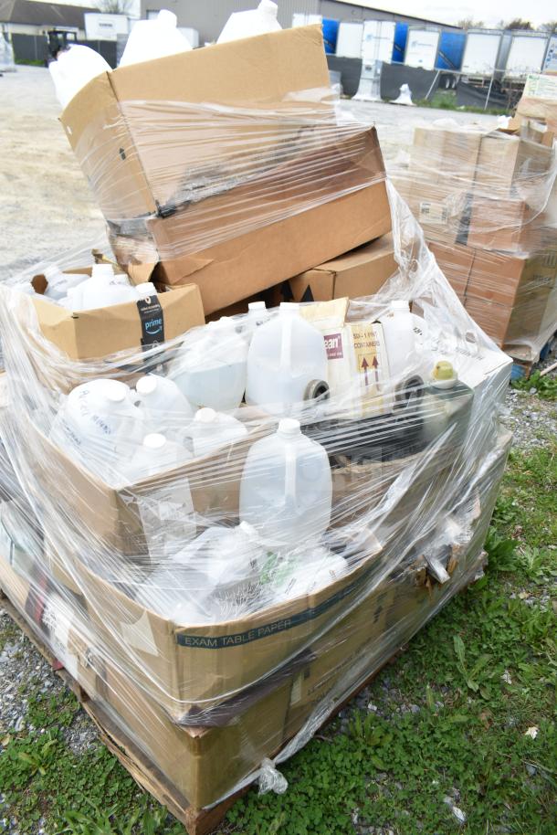 Pallet with 25 new scratch and dent items, including various cleaners and vinegar bottles, wrapped in plastic.