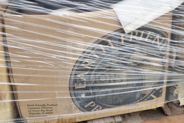 Box of Earth Friendly Products cleaners, wrapped in plastic, with visible label stating "44 Green Bay Road, Winnetka, IL 60093."