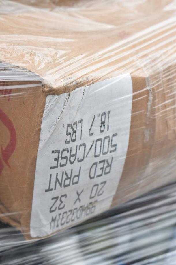 A wrapped cardboard box labeled “500/Case Red Print” with visible signs of wear. Contains various new cleaners and vinegar bottles.