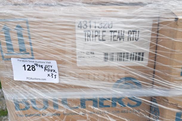 Plastic-wrapped box labeled "Triple Team RTU," with auction details: 35 brand new scratch and dent cleaning items, lot 128.