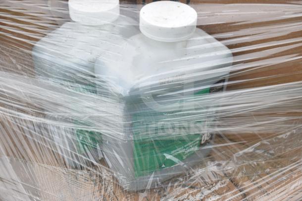 35 new scratch and dent cleaning products, shrink-wrapped on a pallet. Includes various bottles; auction lot.