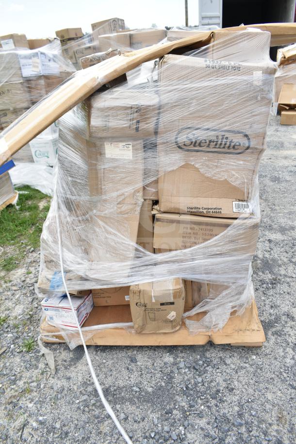 Pallet with 32 boxed items labeled "Sterilite," including beverage glasses and casserole dishes. Wrapped in clear plastic.