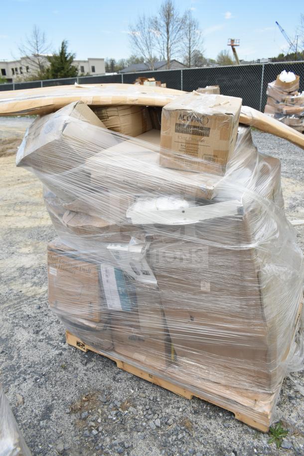 Pallet with 32 new scratch and dent items, including boxed beverage glasses and mini casserole dishes, wrapped in plastic.