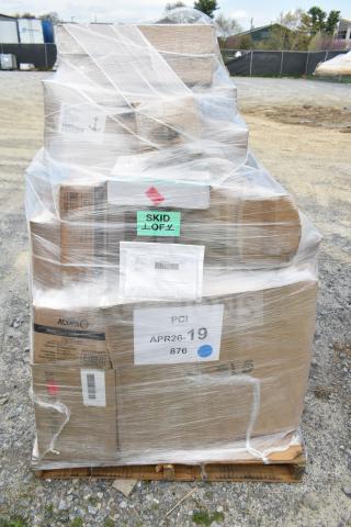 Plastic-wrapped pallet of 40 new items, including a beer tower and wine glasses. Boxes labeled "PCI APR26-19 876" and "SKID."