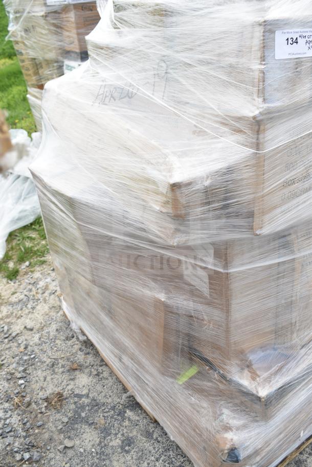 Plastic-wrapped pallet of 40 new scratch and dent items, includes beer tower, wine glasses, beer mugs, baking mats.