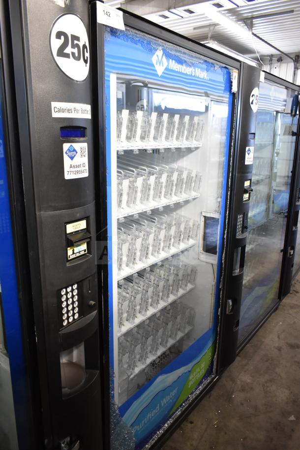 Crane 5800-4 commercial vending machine with bill acceptor, minor glass damage, operates at 115 volts, 1 phase.