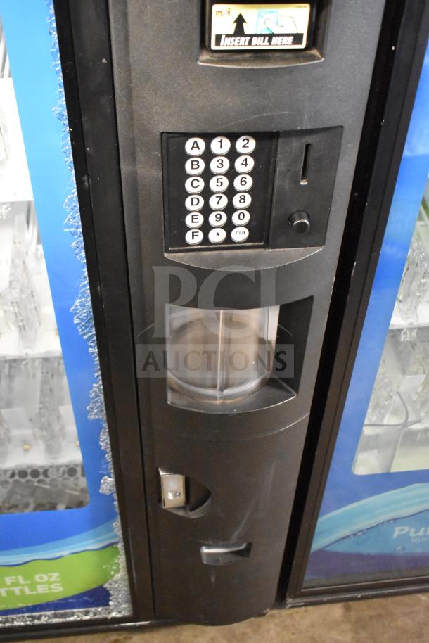 Crane 5800-4 vending machine with bill acceptor, showing keypad and partial glass damage. 115 volts, 1 phase.