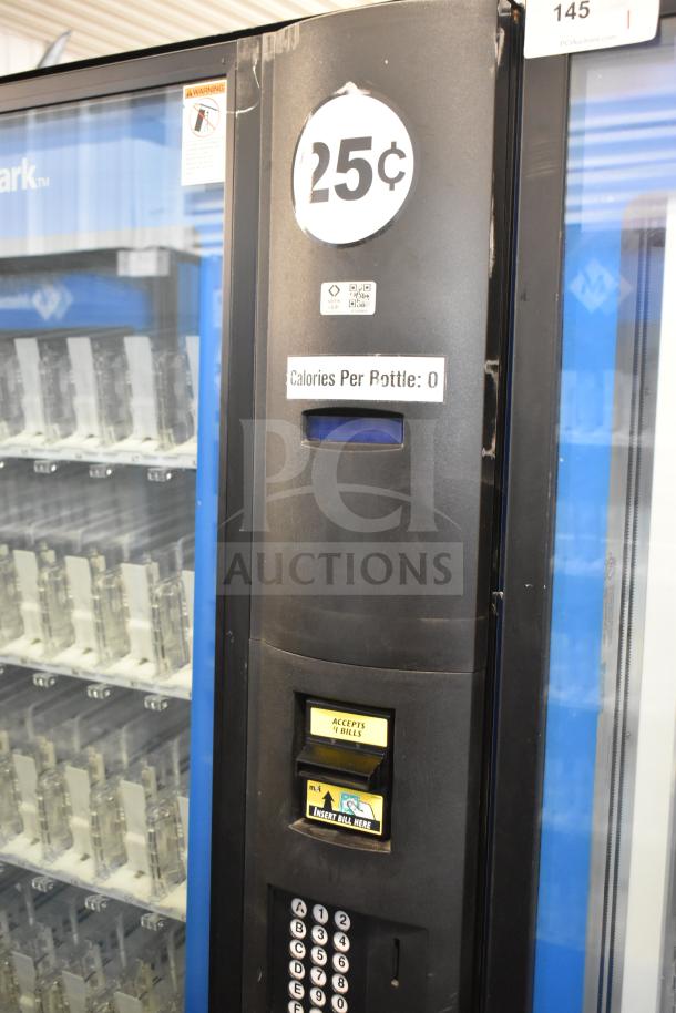 Crane 5800-4 vending machine, accepts bills, 25¢ price display, 115V, 1 phase, commercial use, good condition.
